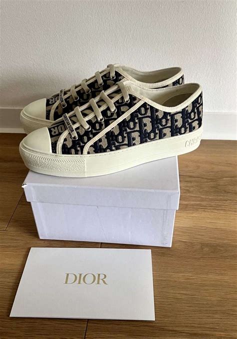 dior tenisky|Dior lace up sneakers.